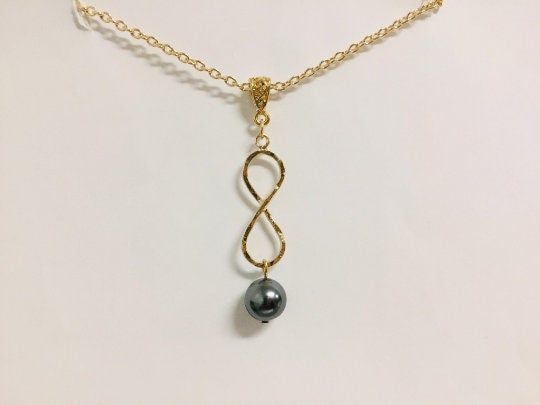 Infinity: Hamilton Gold Earring with new Peacock Shell Pearls