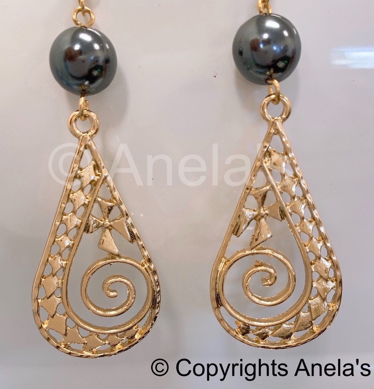 Spiral Polynesian Spear Head: Hamilton Gold Earring with Shell Pearls Fern Opening