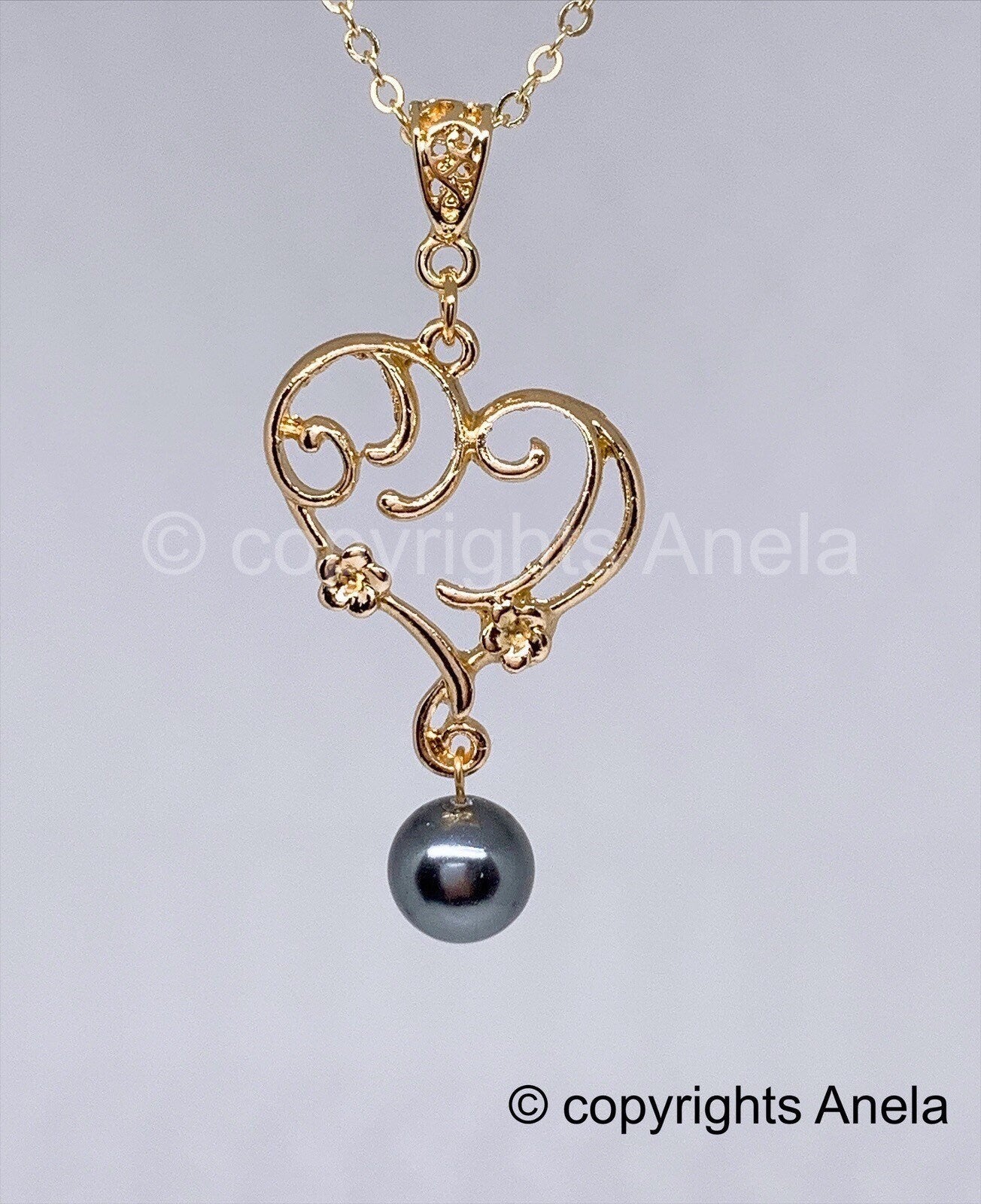 Heart Wave with Plumeria flower: Hamilton Gold Necklace with New Black Greenish Shell Pearls