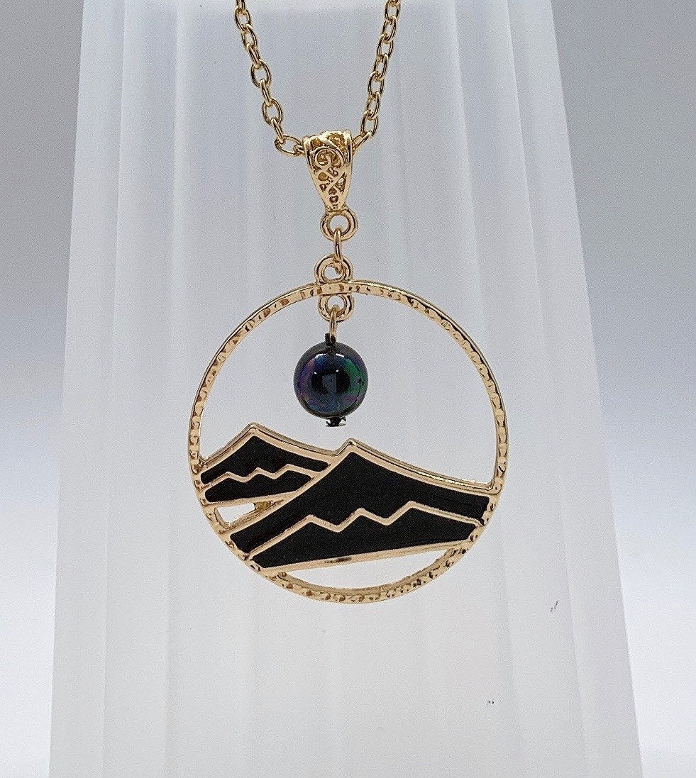 Mauna Kea Black Tribal Rectangle: Hamilton Gold Necklace with new Rainbow Shell Pearls