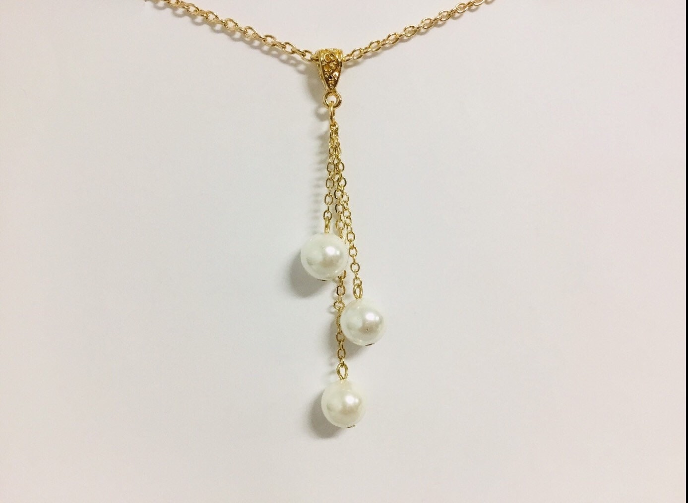 Triple drop: Hamilton Gold Earring with White Shell Pearls