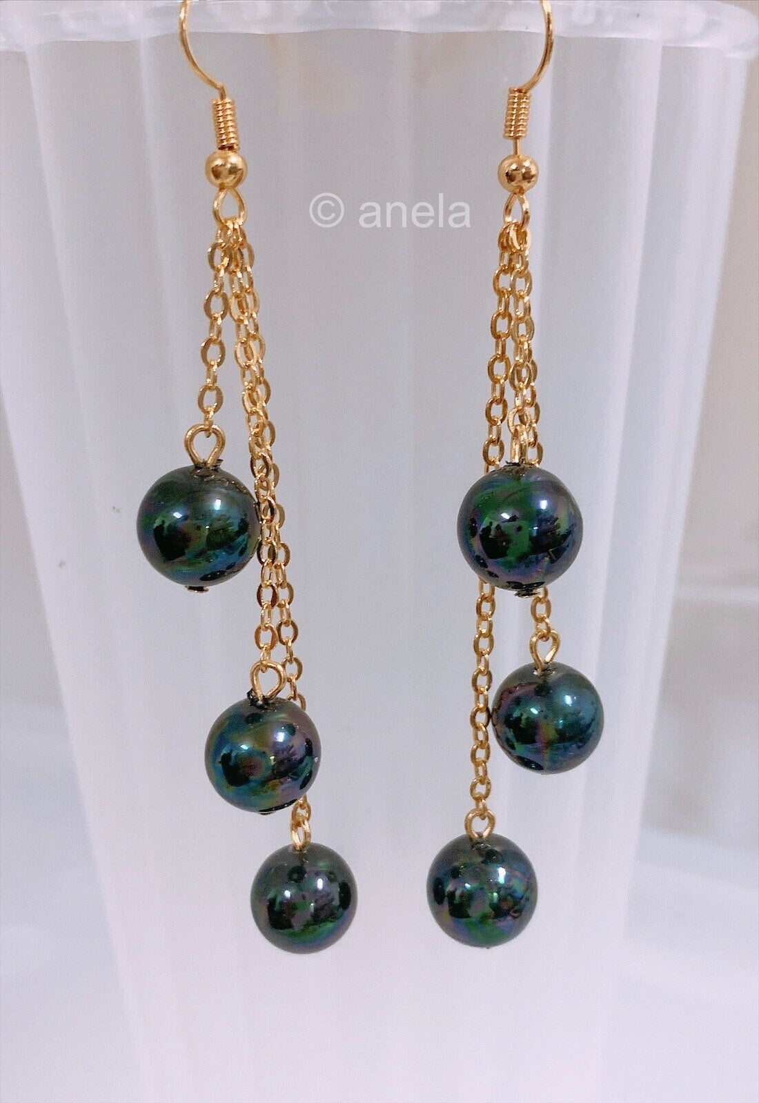 Triple drop: Hamilton Gold Earring with Peacock Black Color Shell Pearls