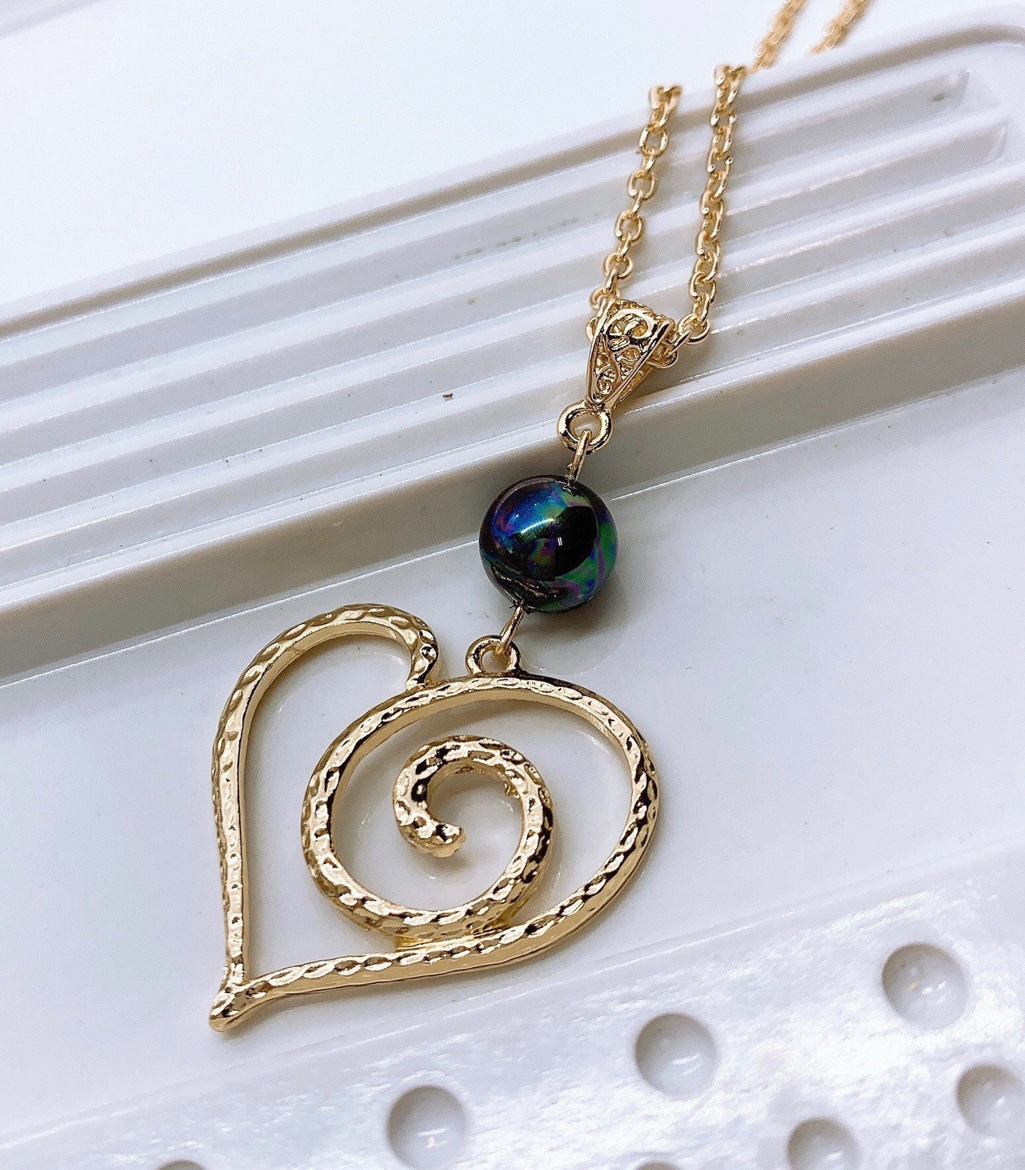 Oceans Wave Piko Heart: Hamilton Gold Earring with  Shell Pearls