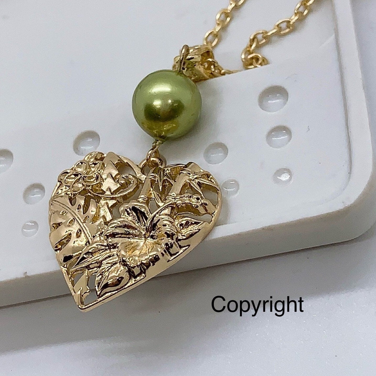 Heart with Bamboo Monstera leaf Hibiscus Plumeria Flowers: Hamilton Gold Earring with Shell Pearls