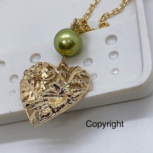 Heart with Bamboo Monstera HibiscusPlumeria flower: Hamilton Gold Necklace with Shell Pearl