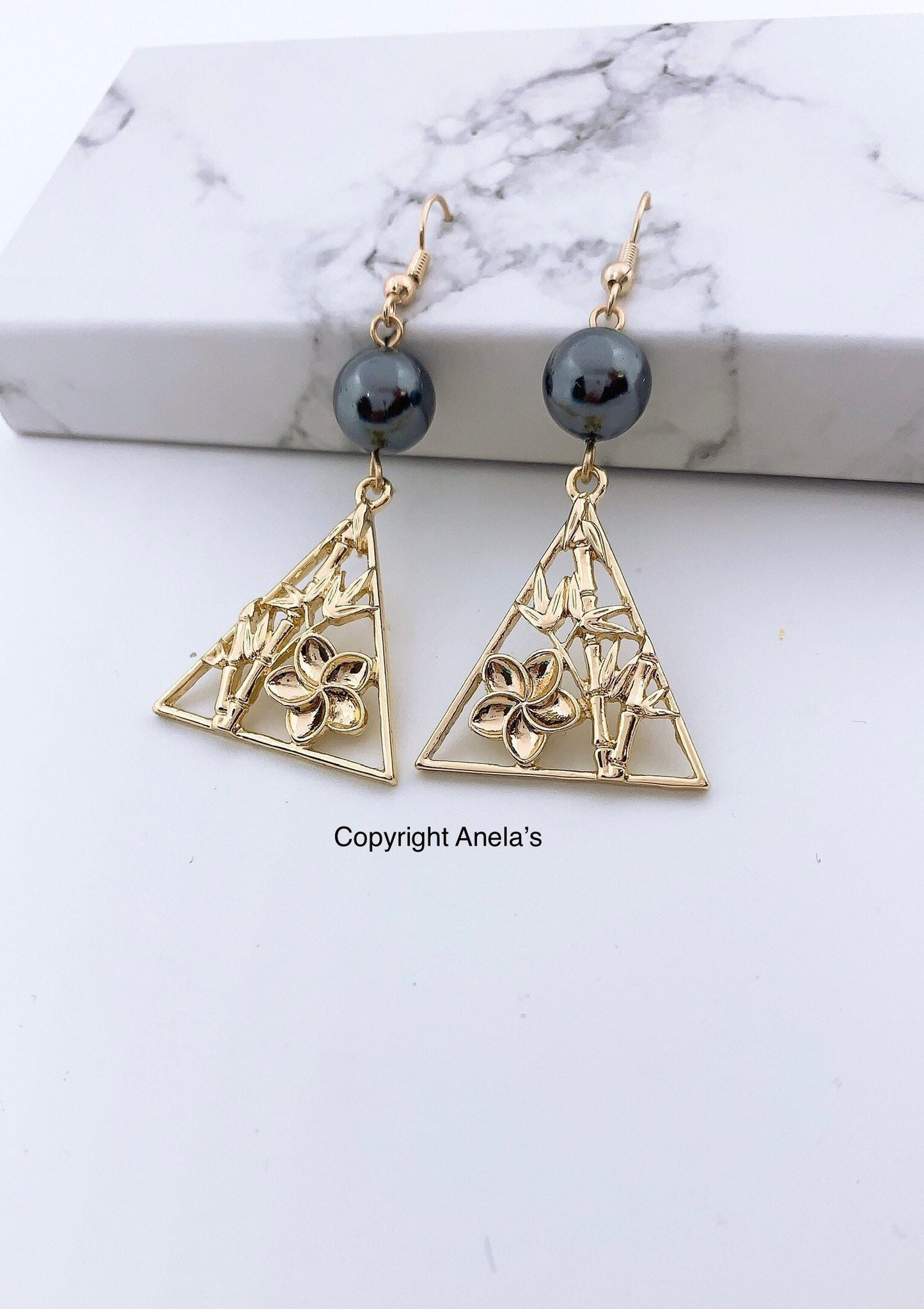 Triangle with Bamboo and Plumeria Flowers: Hamilton Gold Earring with Shell Pearls